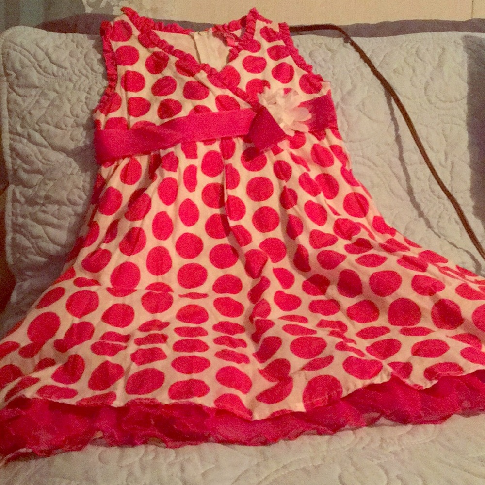 A pretty little girl 👧 poke a dot dress 🤍🤍